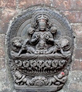 ANepalesestonesculpturedepictingtheSungodSuryaBhaktapur SculpturePedia A Nepalese stone sculpture depicting the Sun god Surya Bhaktapur