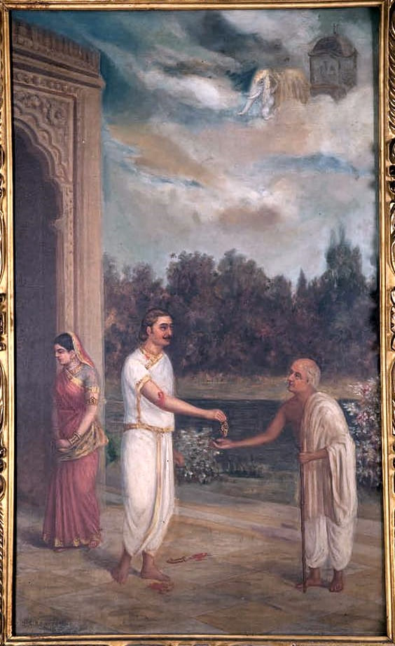 Karna sacrifices his divine armor, while his wife watches in distress